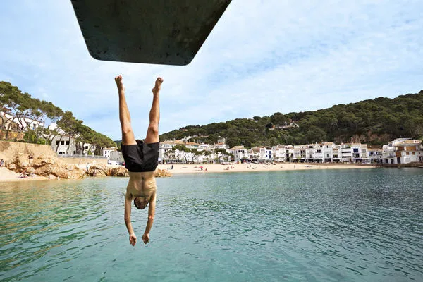 Diving from a diving board in the Mediterranean Sea