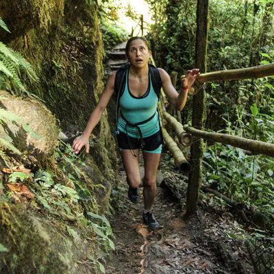 Runner walking by the jungle