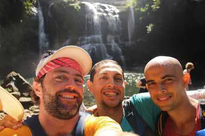 Running guides in a waterfall in Costa Rica